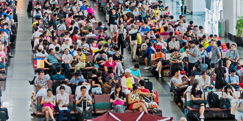 Lots of passengers waiting for boarding